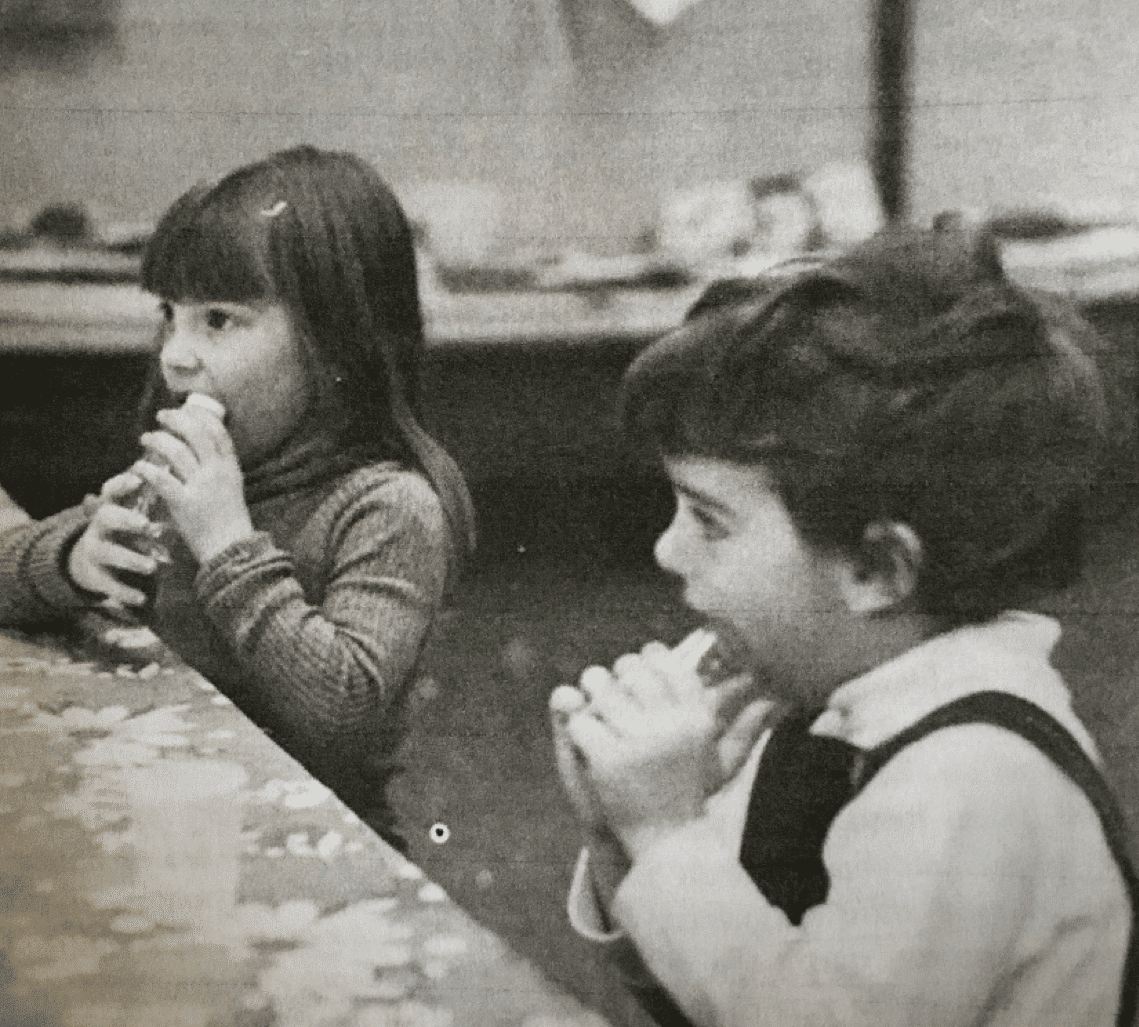 2 children performing child-resistant testing
